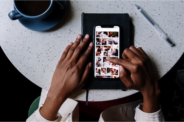 Hands using instagram on a phone