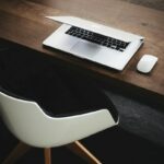 Desk and Chair with laptop and mouse