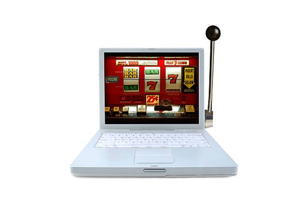 Laptop showing slot online