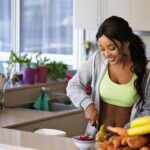 Young lady cooking a healthy meal