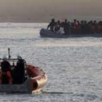 Two migrants die