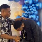 D'banj bowing to Jerry Eze