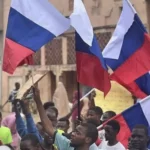 Waving Russian flag treasonable, Waving Russian flag, Russia distances self from flags flown during protest