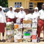 Foundation distributes exercise books