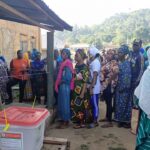 Voters in queues for accreditation