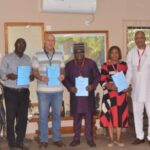 Okomu partners PIND to facilitate community peace, development