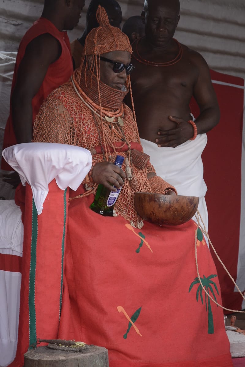 Oba of Benin makes requests at ancestral altars