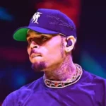 Chris Brown is suing Warner Bros