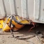 container falls on tricycle in Ogbomoso