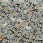 A picture of money. Richest men and women in the world have tons of money