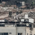 Israeli forces demolish buildings