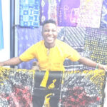Adire artist Agboola Oladapo projecting Yoruba textile art