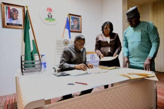 Gov Otu signs bills