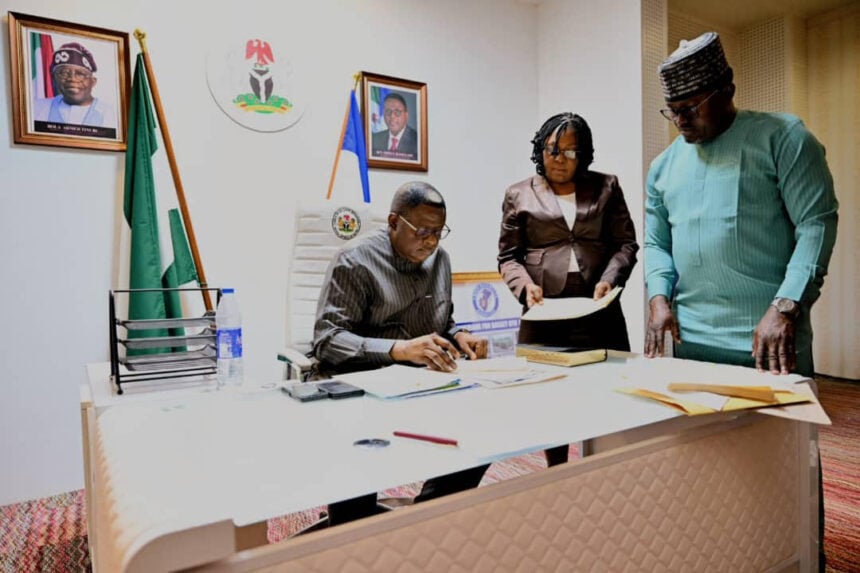 Gov Otu signs bills