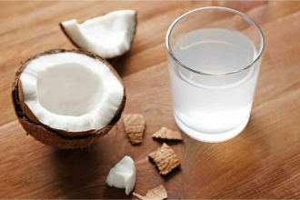 coconut and its water in a cup