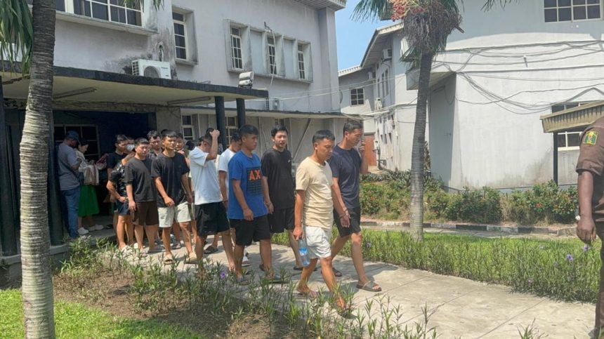 Court jails nine Chinese