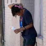 A man suffering from heat wave in the US,