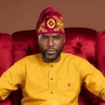Nollywood actor, Ibrahim Chatta sitting