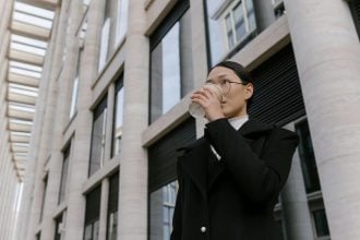 a woman wearing a black suit