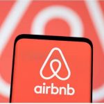 Logo of Airbnb on a mobile phone.