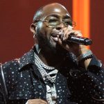 Davido performing on stage,
