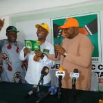 Imasuagbon receiving ADC membership card in Edo