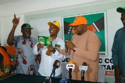 Imasuagbon receiving ADC membership card in Edo