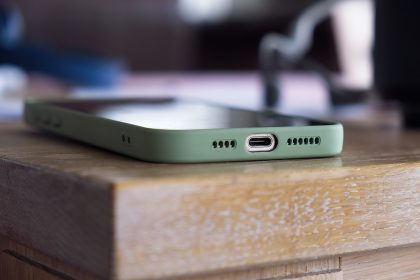 Mobile phone on a wooden surface