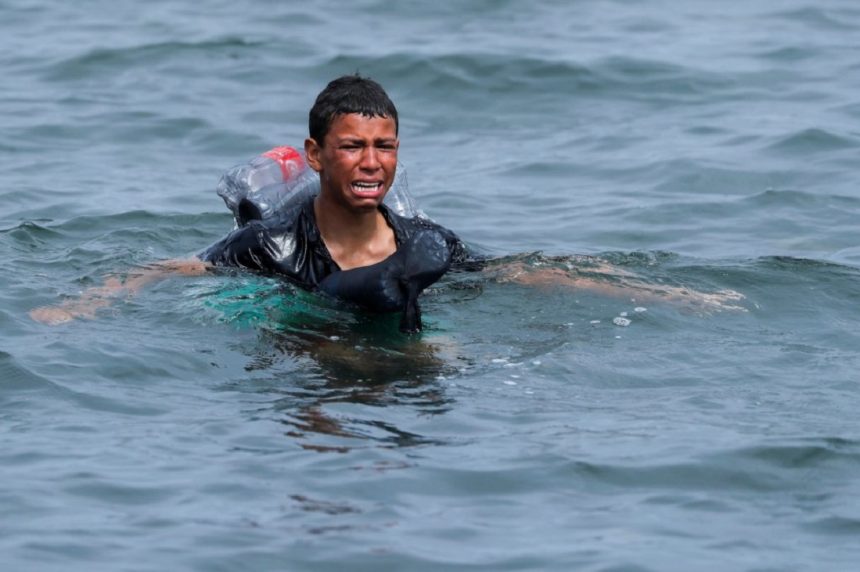A Moroccan boy swimming to the Spanish enclave of Ceuta