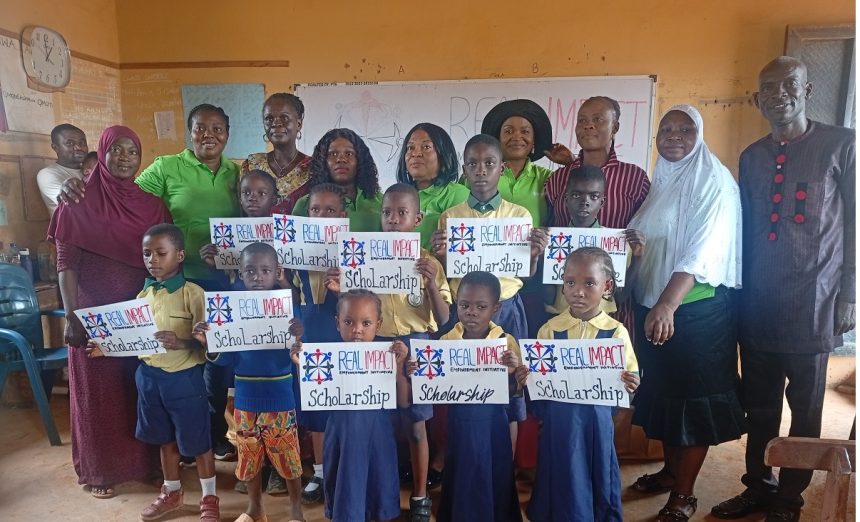 NGO presenting scholarships to primary school pupils in Ibadan,