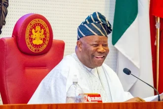 Godswill Akpabio laughing,