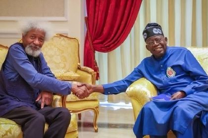 Nobel Laureate Professor Wole Soyinka and Nigeria's President, Bola Ahmed Tinubu having an handshake.