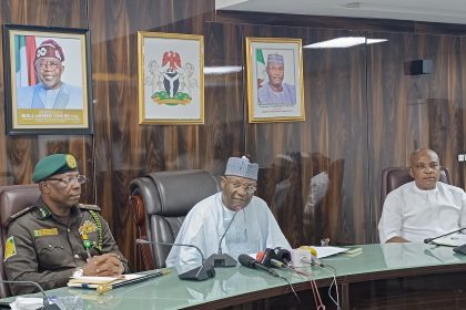 The Controller General of the Nigerian Correctional Service (NCoS), Sylvester Ndidi Nwakuche Ofori and INEC Chairman Mahmood Yakubu