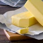A picture of butter on a foil paper,