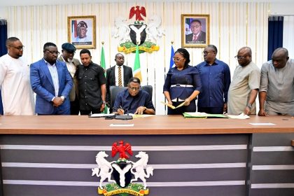 Governor Bassey Otu signing the Cross River State Supplementary Appropriation Bill 2025 into law