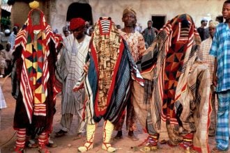 Egungun participating in the Masquerade festival