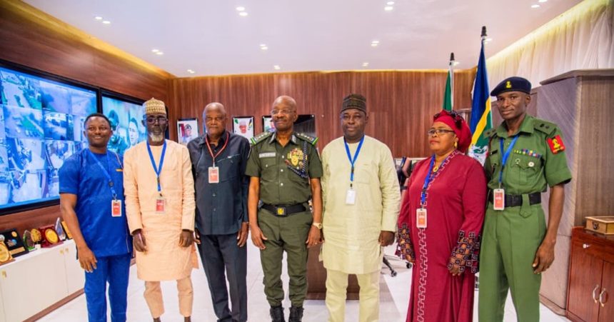 IGP Kayode Egbetokun with Special Assistant to the President on ICT Development and Digital Innovation, Mr. Tokoni Peter Igoin, and other delegation from Nigeria’s financial technology sector.