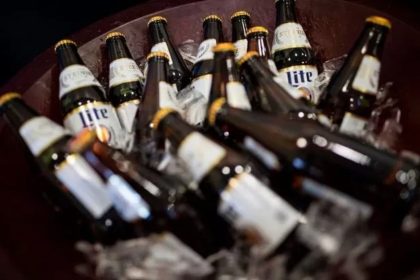 Bottles of Miller Lite who is giving out free beer