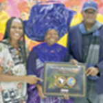 Founder of Nike Art Gallery, Dr Nike Okudaiye (middle) presented with an Award of Africa Travel 100 Global leaders by the Akwaaba team; organiser AfTM, Amb.Ikechi Uko (right) and Deborah Chimezie-Mike (left).