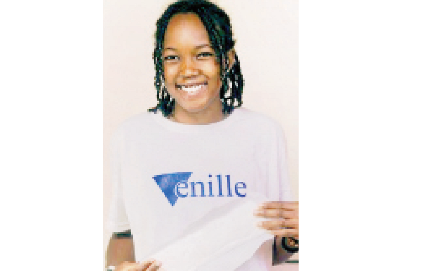 Bunmi Esther Olalude holding menstrual pad