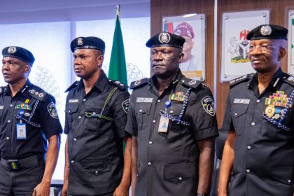 IGP Egbetokun with the promoted Police officers