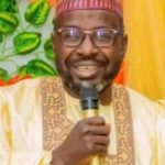 Sheikh Nura Gwanda, the Imam at Kofar Marusa Juma'at Mosque in Katsina smiling