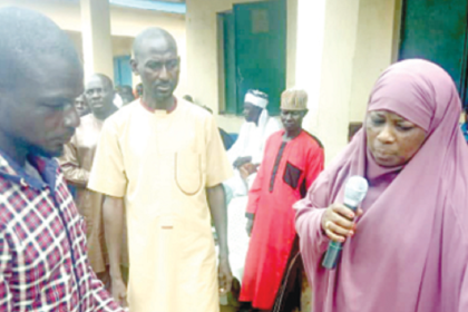 Niger State Commissioner of Transport, Hajiya Hadiza Idris Kuta presenting gifts to victims at Munya Local Government Area