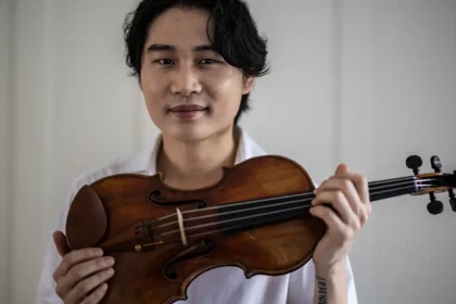 Berlin-based South Korean violinist Inmo Yang poses with the "Carrodus violin" in Berlin, Germany