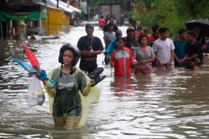 People walking in the flood in Inner Mongolia ,