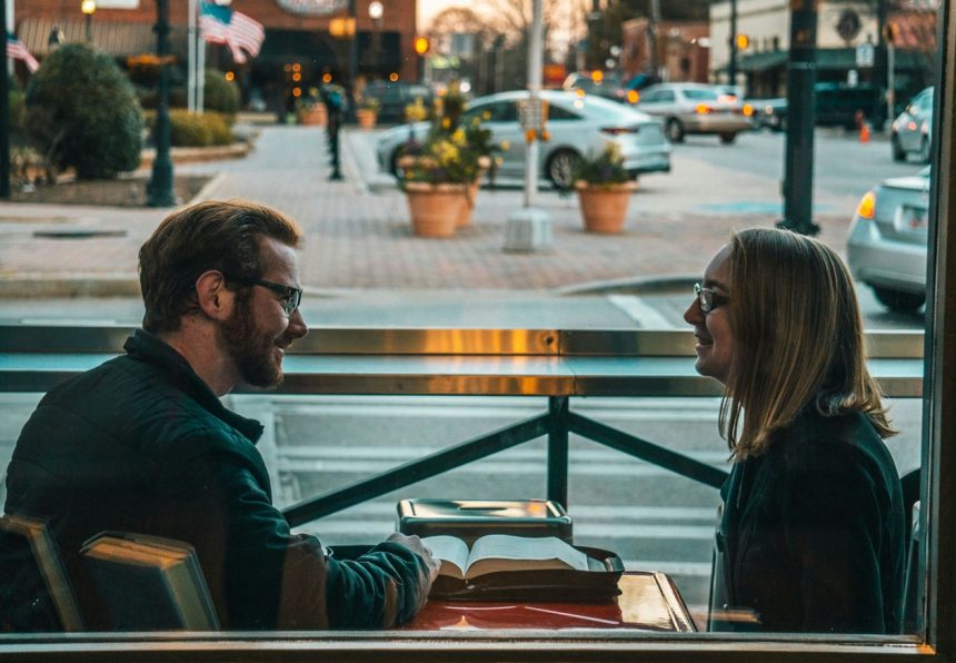 man and woman having a conversation