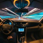 man driving a car