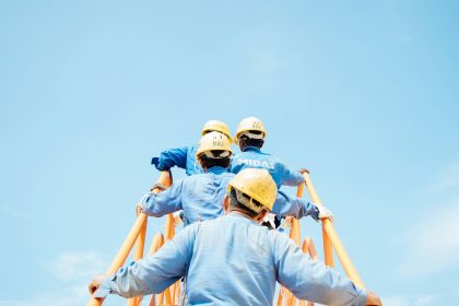 workers climbing the stairs