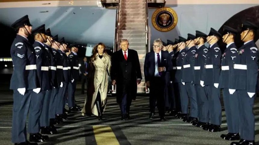 President Donald Trump and wife holding hands upon arrival in the UK