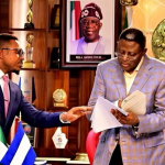 Commissioner for Finance, Dr Mike Odere with Governor Bassey Otu
